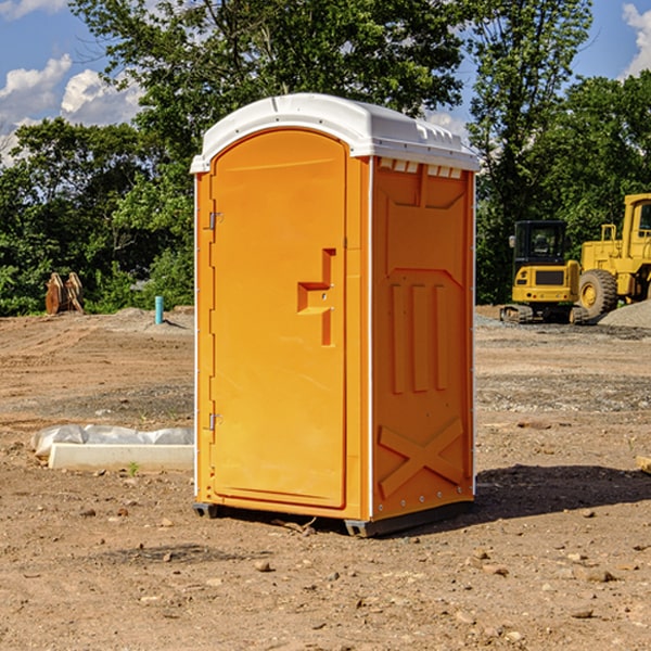 how often are the portable restrooms cleaned and serviced during a rental period in Ames OH